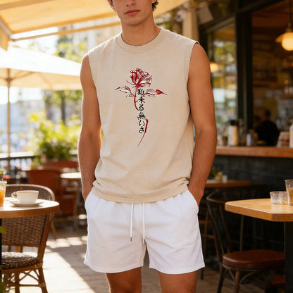 Person wearing a sleeveless shirt with a red floral design in an outdoor cafe setting